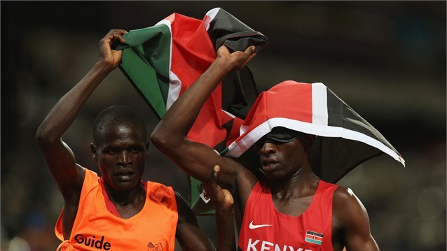 Kenya's Samwel Muchai(right) and his guide James Boit celebrate after winning the 1500m T11  race in a world record time.(Photo:London2012)